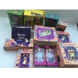 A collection of boxed dolls and accessories includ