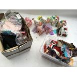 A box containing a collection of vintage Sindy , Barbie and Patch clothes and accessories, also