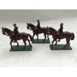 Britains toys 3x Diecast police officers on horseback