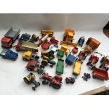 A collection of loose Diecast vehicles including Britains farm machinery, Tractors, Trailers, Land