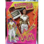 A boxed Jem Rock n Gold Rio doll and cassette.