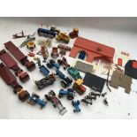 A collection of loose playworn diecast farm vehicl