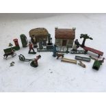 A collection of Diecast farmyard figures, animals and accessories