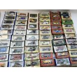 A collection of boxed diecast vehicles including O