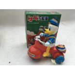 Japanese, Walt Disney, Donald Duck on a tricycle,