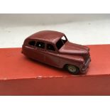 Dinky toys, unboxed Standard Vanguard #40e, in Maroon red with brown wheel caps , maybe repainted