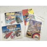 A collection of toy catalogs including Dinky, Britains, Siku and Matchbox