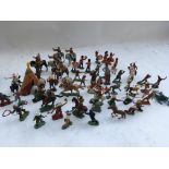 A collection of plastic and Diecast , Britains soldiers, Cowboys and Indians , Military bandsman and