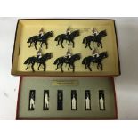 A collection of Diecast soldiers on horseback , Br