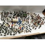 A collection of loose plastic figures including Co