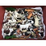 A collection of loose plastic farmyard animals, including Britains