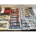 A collection of boxed diecast vehicles including L