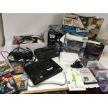 A box of gaming machines and games including Wi fi