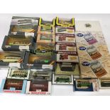 A collection of boxed die cast vehicles including