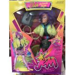 A boxed Jem Clash doll and cassette.