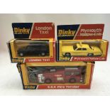 Dinky toys, collection of boxed Diecast vehicles including #284 London Taxi, #278 Plymouth yellow