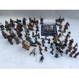 A collection of loose Diecast and plastic military soldiers including Britains, Del prado etc
