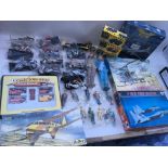 A box containing a collection of Maisto Motorcycles, Model kits, Corgi Aviation archive Boeing