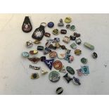 A collection of enamel motorcycle related badges a