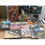 A collection of boxed model kits , some are part built , most are as new, including Airfix,