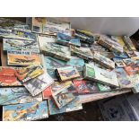 A large collection of boxed model kits that have b