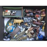 A collection of loose Diecast farmyard animals etc including Britains etc