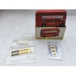 Dinky toys, #289 Routemaster Bus , mint in box, also Original extra stickers for side of bus and