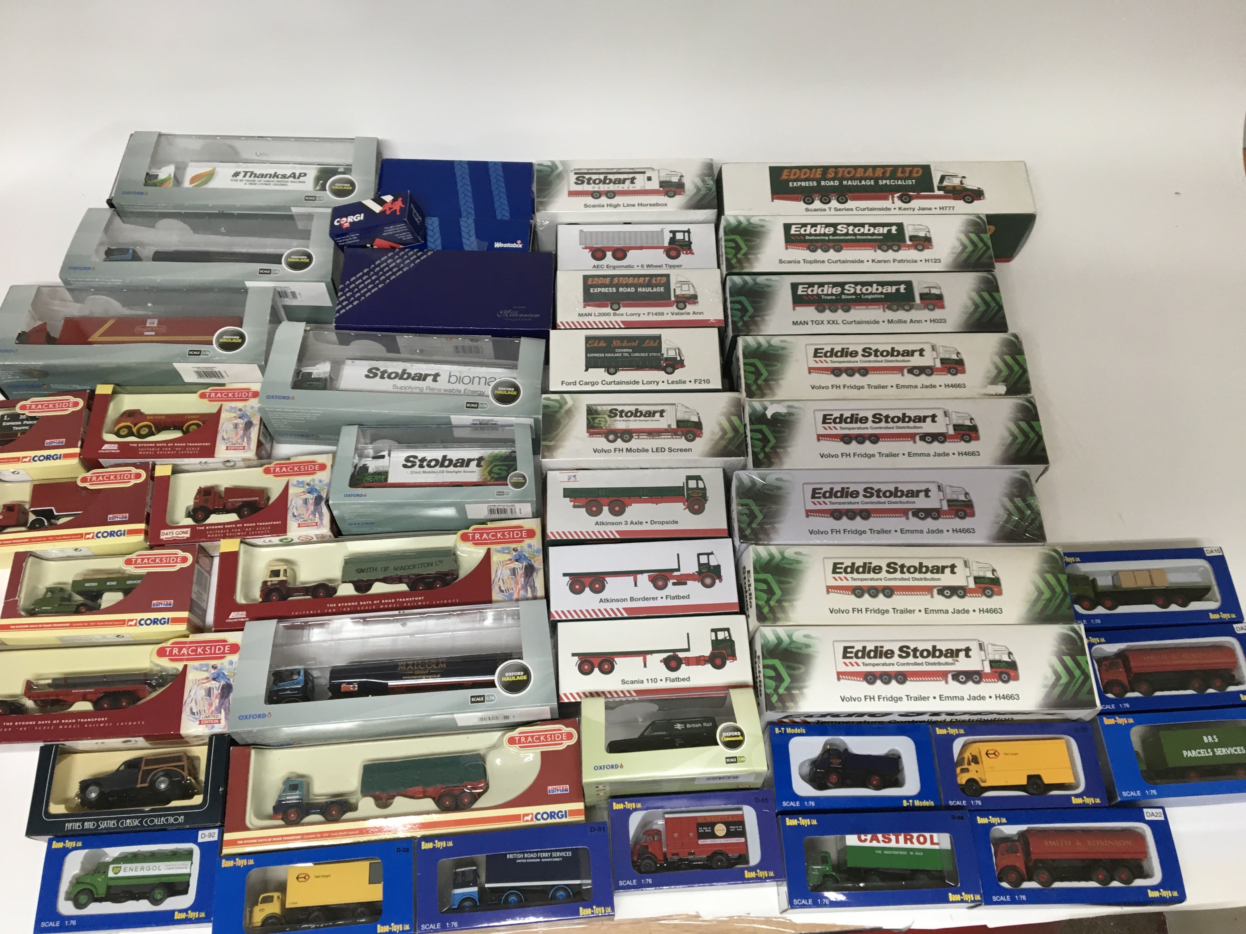 A collection of boxed die cast vehicles including