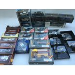 A collection of boxed diecast vehicles including M