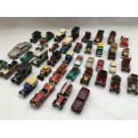 A collection of loose die cast vehicles including