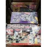 Three boxed original Transformers comprising Optim