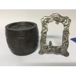 A Chinese Republic ceramic tobacco jar and a silver plated photo frame (2)