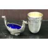 A novelty hallmarked silver toddy cup in the form of a thimble plus a Marius Hammer table salt