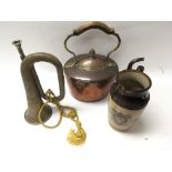 A copper kettle, brass bugle and earthenware jug commemorating Queen Victoria's reigh