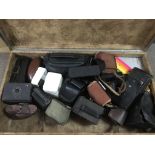 A suitcase containing a collection of vintage cameras.