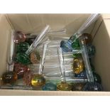A box of bubble glass bud vases