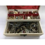 A box of costume jewellery.