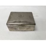 A silver cigarette box the hinged lid enclosing a fitted interior London hallmarks