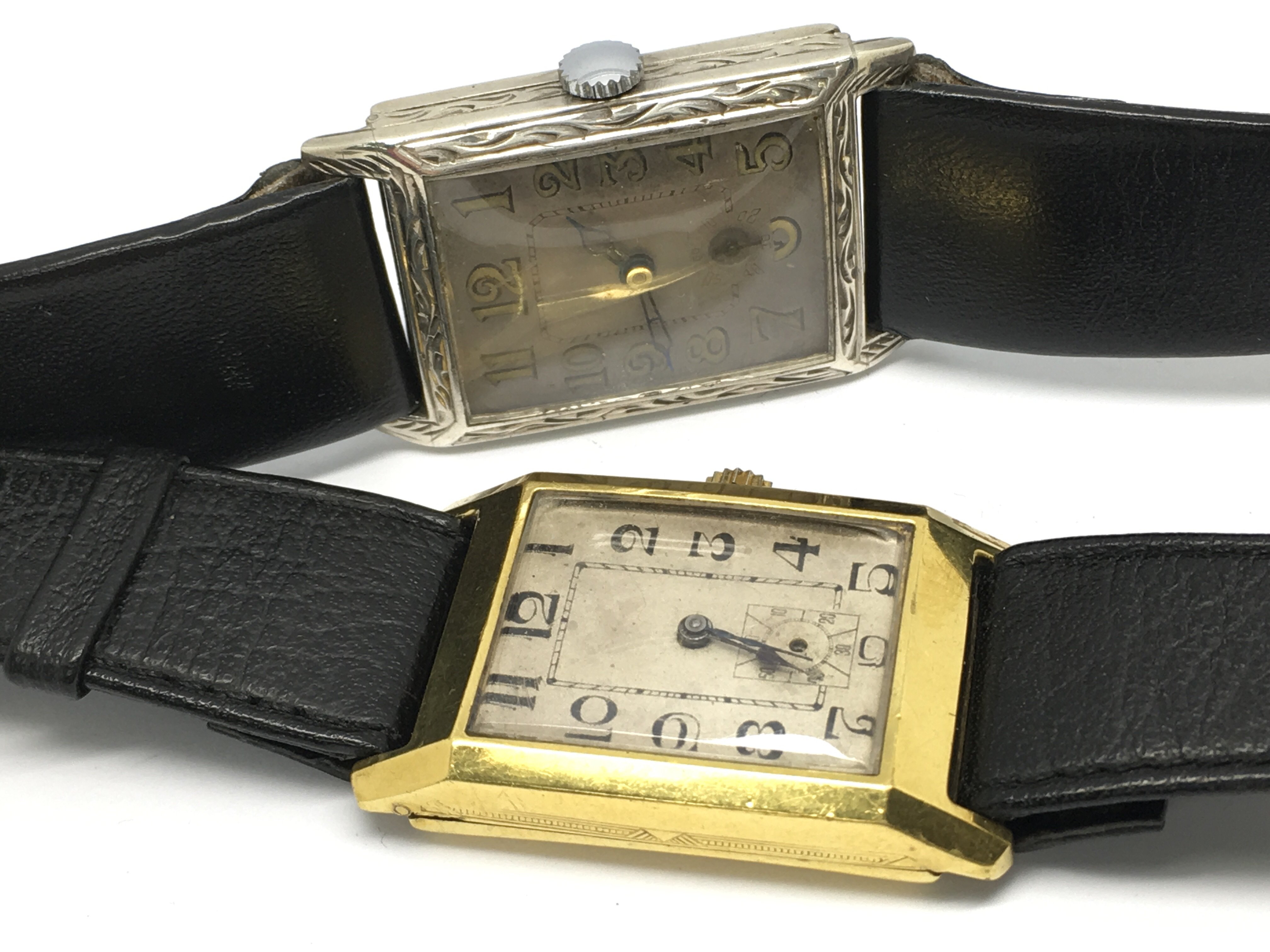 A silver case wristwatch with square dial a gold p