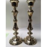 A pair of silver candle sticks Birmingham hallmarks 27 cm