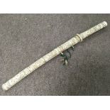 A 19th Century Japanese sword, the blade 30cm, hilt and scabbard completely covered in bone and