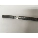 A II world war bayonet with polished steel handle and scabbard conforming serial numbers.