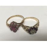 Two 9carat gold rings set with a small diamond and ruby coloured stones. Weight 4.5g