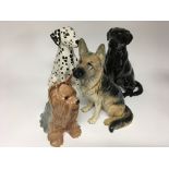 Four ceramics Beswick dogs including a 36CM Dalmatian