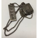 A hallmarked silver ingot pendant and chain together with an hallmarked silver engraved locket