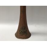 A large copper horn with “Royal Mail” stamped and attached brass coat of arms. Length approx 117cm.