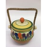 A Clarice Cliff 'Crocus' pattern biscuit barrel wi