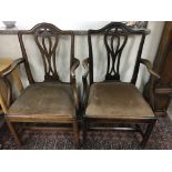 A set of 8 Georgian mahogany dining chairs including two carvers.