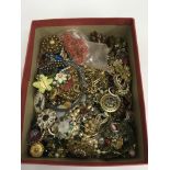 A box of various costume jewellery