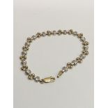 A 9ct gold, two tone, contemporary design bracelet